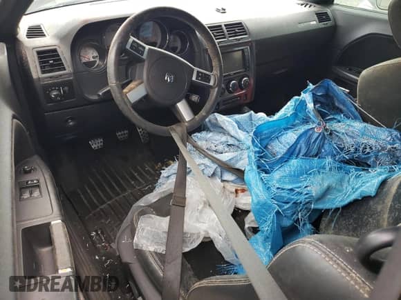 2010 Dodge Challenger SRT-8 z VIN 2B3CJ7DW7AH270018, wystawiony jako Copart lot #72088594 z przebiegiem Nie podano mil oraz Szkoda całkowita • Salvage title. Historia ofert i sprzedaży dostępna na DreamBid. Obrazek 8.