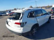 ✅ 2017 Honda Pilot EX-L • VIN: 5FNYF6H5XHB098584 • Lot: 43664045. Listed on IAAI with 119,767 mi. Free auction sales archive from the USA and detailed vehicle history report at DreamBid. Image 4.