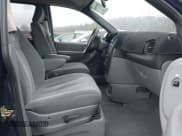 ✅ 2005 Dodge Caravan SXT • VIN: 2D4GP44L65R148904 • Lot: 43863888. Wystawiony na IAAI z przebiegiem 142 934 mil. Bezpłatny archiwum sprzedaży aukcyjnych z USA i szczegółowy raport historii pojazdu na DreamBid. Zdjęcie 5.