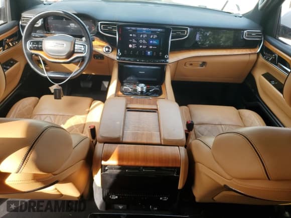 ✅ 2022 Jeep Grand Wagoneer Series III • VIN: 1C4SJVGJ1NS196902 • Lot: 81371045. Listed on Copart with 49,828 mi. Free auction sales archive from the USA and detailed vehicle history report at DreamBid. Image 8.