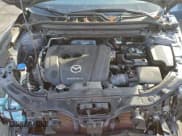 ✅ 2021 Mazda CX-5 Touring • VIN: JM3KFBCM2M0452532 • Lot: 94545745. Wystawiony na Copart z przebiegiem 39 281 mil. Bezpłatny archiwum sprzedaży aukcyjnych z USA i szczegółowy raport historii pojazdu na DreamBid. Zdjęcie 12.