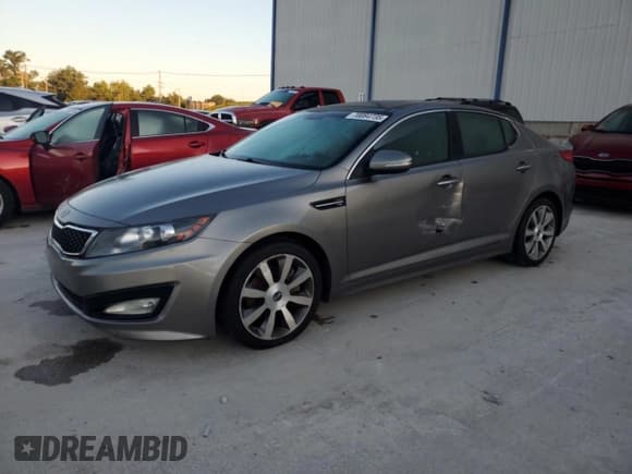 ✅ 2012 Kia Optima SX • VIN: 5XXGR4A6XCG008771 • Лот: 70084735. Опубликован ранее на Copart с пробегом 240 653 миль. Бесплатный доступ к архиву аукционных продаж из США и подробный отчёт об истории автомобиля на DreamBid. Изображение 1.