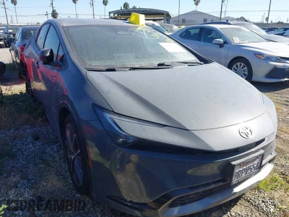 2023 Toyota Prius LE z VIN JTDACAAUXP3006206, wystawiony jako IAAI lot #42047362 z przebiegiem 36 206 mil mil oraz . Historia ofert i sprzedaży dostępna na DreamBid. Obrazek 1.