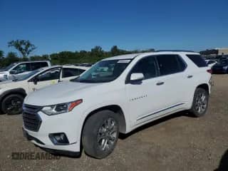 2021 Chevrolet Traverse Premier z VIN 1GNEVKKW6MJ180807, wystawiony jako Copart lot #69849255 z przebiegiem 108 013 mil mil oraz Szkoda całkowita • Salvage title. Historia ofert i sprzedaży dostępna na DreamBid. Obrazek 1.