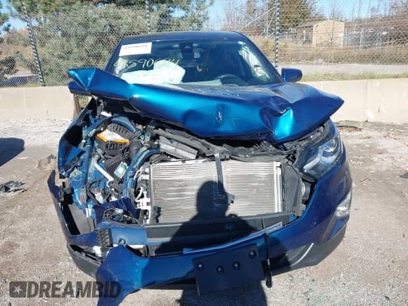 ✅ 2021 Chevrolet Equinox LT • VIN: 2GNAXUEVXM6121957 • Lot: 43590694. Listed on IAAI with 55,483 mi. Free auction sales archive from the USA and detailed vehicle history report at DreamBid. Image 12.