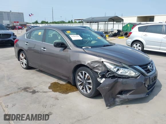 ✅ 2017 Nissan Altima SV • VIN: 1N4AL3AP2HC111156 • Lot: 42303588. Listed on IAAI with 103,004 mi. Free auction sales archive from the USA and detailed vehicle history report at DreamBid. Image 1.