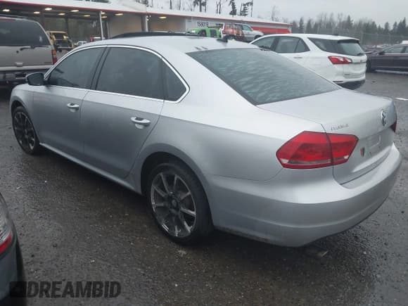 ✅ 2013 Volkswagen Passat SE • VIN: 1VWBN7A39DC035312 • Lot: 43887122. Listed on IAAI with 143,911 mi. Free auction sales archive from the USA and detailed vehicle history report at DreamBid. Image 3.