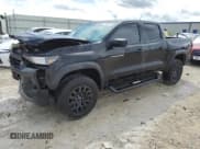 ✅ 2023 Chevrolet Colorado 4WD Trail Boss • VIN: 1GCPTEEK0P1252834 • Лот: 71637444. Опубликован ранее на Copart с пробегом 8 096 миль. Бесплатный доступ к архиву аукционных продаж из США и подробный отчёт об истории автомобиля на DreamBid. Изображение 1.