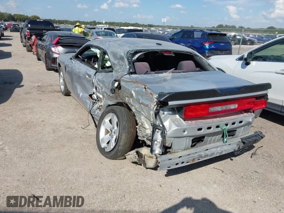 ✅ 2012 Dodge Challenger SXT Plus • VIN: 2C3CDYAG2CH134430 • Лот: 43382408. Опубликован ранее на IAAI с пробегом Не указан. Бесплатный доступ к архиву аукционных продаж из США и подробный отчёт об истории автомобиля на DreamBid. Изображение 3.