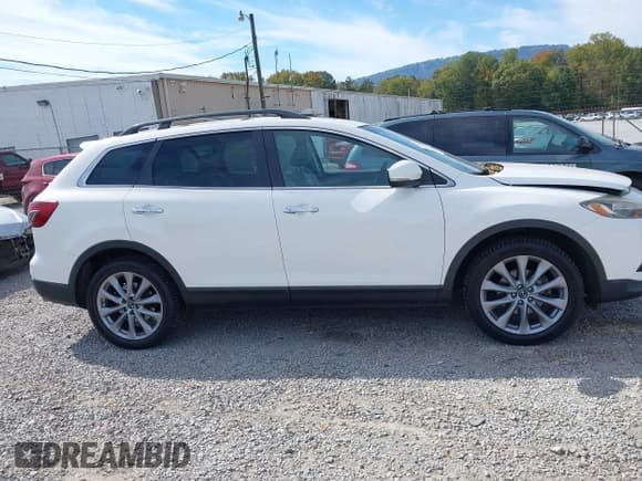 ✅ 2015 Mazda CX-9 Grand Touring • VIN: JM3TB3DA4F0460029 • Lot: 43481240. Wystawiony na IAAI z przebiegiem 161 434 mil. Bezpłatny archiwum sprzedaży aukcyjnych z USA i szczegółowy raport historii pojazdu na DreamBid. Zdjęcie 13.