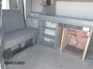 ✅ 1997 Volkswagen EuroVan CV • VIN: WV2EH8701VH144427 • Lot: 41844978. Wystawiony na IAAI z przebiegiem 206 156 mil. Bezpłatny archiwum sprzedaży aukcyjnych z USA i szczegółowy raport historii pojazdu na DreamBid. Zdjęcie 8.