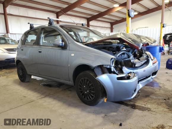 2007 Chevrolet Aveo LS z VIN KL1TD66627B727713, wystawiony jako Copart lot #85948965 z przebiegiem 160 919 mil mil oraz Szkoda całkowita • Salvage title. Historia ofert i sprzedaży dostępna na DreamBid. Obrazek 4.