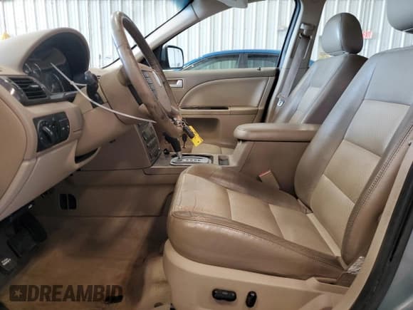 ✅ 2005 Mercury Montego Premier • VIN: 1MEFM43185G619517 • Лот: 63030185. Опубликован ранее на Copart с пробегом 169 180 миль. Бесплатный доступ к архиву аукционных продаж из США и подробный отчёт об истории автомобиля на DreamBid. Изображение 7.