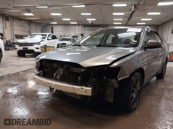 ✅ 2014 Mitsubishi Lancer SE • VIN: JA32V2FW6EU018244 • Lot: 41395111. Listed on IAAI with 160,169 mi. Free auction sales archive from the USA and detailed vehicle history report at DreamBid. Image 6.