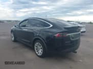 ✅ 2016 Tesla Model X 70D • VIN: 5YJXCDE28GF026302 • Lot: 42548063. Listed on IAAI with 89,847 mi. Free auction sales archive from the USA and detailed vehicle history report at DreamBid. Image 3.