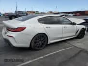 ✅ 2021 BMW 8 Series M850i • VIN: WBAGV8C04MCF56486 • Lot: 55991015. Listed on Copart with 60,249 mi. Free auction sales archive from the USA and detailed vehicle history report at DreamBid. Image 3.