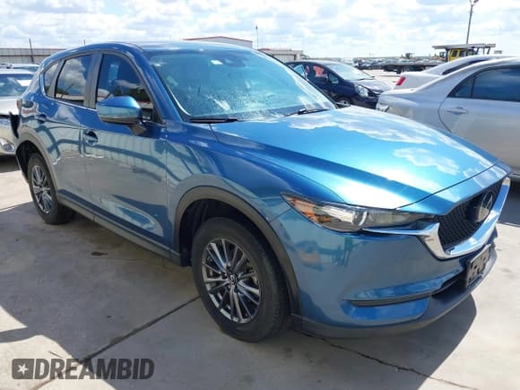 ✅ 2021 Mazda CX-5 Sport • VIN: JM3KFABM7M0408408 • Lot: 43315102. Wystawiony na IAAI z przebiegiem 34 141 mil. Bezpłatny archiwum sprzedaży aukcyjnych z USA i szczegółowy raport historii pojazdu na DreamBid. Zdjęcie 1.