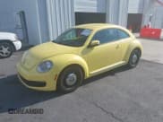 ✅ 2013 Volkswagen Beetle 2.5L • VIN: 3VWHX7AT7DM613197 • Lot: 41298890. Listed on IAAI with 130,219 mi. Free auction sales archive from the USA and detailed vehicle history report at DreamBid. Image 2.