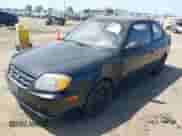 2003 Hyundai Accent с VIN KMHCF35CX3U271513, выставлен на аукционе IAAI как лот 42083235 с пробегом 166 240 миль миль и . История ставок и продаж доступна на DreamBid. Изображение 2.