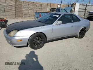 ✅ 2001 Honda Prelude • VIN: JHMBB614X1C000903 • Lot: 62424035. Wystawiony na Copart z przebiegiem 150 959 mil. Bezpłatny archiwum sprzedaży aukcyjnych z USA i szczegółowy raport historii pojazdu na DreamBid. Zdjęcie 1.