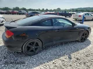 2003 Hyundai Tiburon GT с VIN KMHHN65F13U071950, выставлен на аукционе Copart как лот 62307475 с пробегом 173 191 миль миль и Списание • Salvage title. История ставок и продаж доступна на DreamBid. Изображение 3.