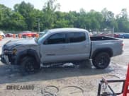 ✅ 2021 Toyota Tacoma SR • VIN: 3TMCZ5AN1MM399207 • Lot: 42475374. Listed on IAAI with 107,167 mi. Free auction sales archive from the USA and detailed vehicle history report at DreamBid. Image 14.