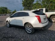 ✅ 2016 Cadillac SRX Premium Collection • VIN: 3GYFNDE37GS551769 • Lot: 69224115. Wystawiony na Copart z przebiegiem 113 338 mil. Bezpłatny archiwum sprzedaży aukcyjnych z USA i szczegółowy raport historii pojazdu na DreamBid. Zdjęcie 2.