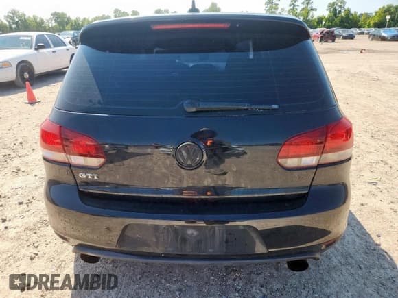 ✅ 2014 Volkswagen Golf GTI Wolfsburg Edition • VIN: WVWGD7AJ2EW008012 • Lot: 71723355. Wystawiony na Copart z przebiegiem 148 088 mil. Bezpłatny archiwum sprzedaży aukcyjnych z USA i szczegółowy raport historii pojazdu na DreamBid. Zdjęcie 6.