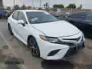 2020 Toyota Camry SE with VIN 4T1M11AK4LU952268, listed as a IAAI auction lot 43320552 with 79,829 mi miles and . Bid and sale history available at DreamBid. Image 1.