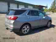 2018 Chevrolet Equinox Premier с VIN 3GNAXPEU6JL402105, выставлен на аукционе Copart как лот 60569335 с пробегом 37 068 миль миль и Списание • Salvage title. История ставок и продаж доступна на DreamBid. Изображение 3.