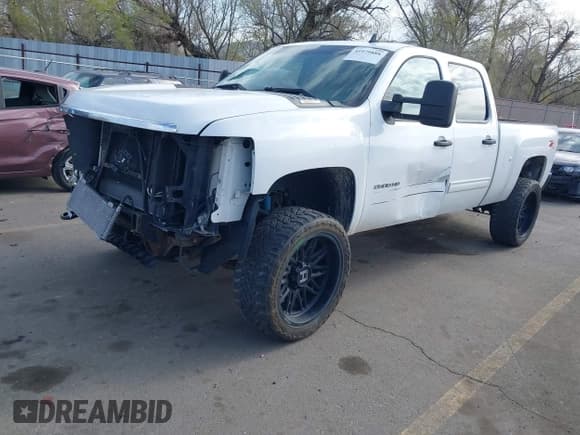 ✅ 2013 Chevrolet Silverado 2500HD LT • VIN: 1GC1KXCG2DF139002 • Lot: 41979888. Listed on IAAI with 198,634 mi. Free auction sales archive from the USA and detailed vehicle history report at DreamBid. Image 2.