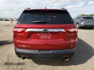 ✅ 2021 Chevrolet Traverse LT • VIN: 1GNEVHKW3MJ164180 • Lot: 71749514. Wystawiony na Copart z przebiegiem 36 650 mil. Bezpłatny archiwum sprzedaży aukcyjnych z USA i szczegółowy raport historii pojazdu na DreamBid. Zdjęcie 6.