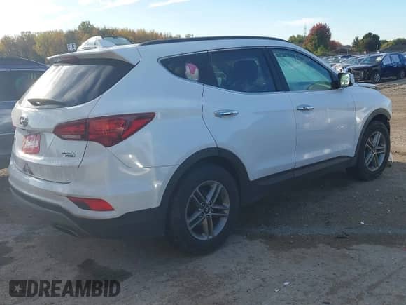 2018 Hyundai Santa Fe 2.4L z VIN 5NMZUDLB1JH097002, wystawiony jako IAAI lot #43473652 z przebiegiem 182 069 mil mil oraz . Historia ofert i sprzedaży dostępna na DreamBid. Obrazek 4.