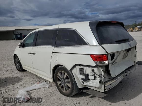 ✅ 2015 Honda Odyssey Touring Elite • VIN: 5FNRL5H91FB034652 • Lot: 85344475. Listed on Copart with 141,950 mi. Free auction sales archive from the USA and detailed vehicle history report at DreamBid. Image 2.