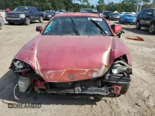 ✅ 2006 Hyundai Tiburon GS • VIN: KMHHM65D46U229462 • Лот: 70912605. Опубликован ранее на Copart с пробегом 169 009 миль. Бесплатный доступ к архиву аукционных продаж из США и подробный отчёт об истории автомобиля на DreamBid. Изображение 5.