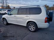 ✅ 2003 Suzuki XL7 Touring • VIN: JS3TX92V434110649 • Lot: 94664685. Listed on Copart with 173,322 mi. Free auction sales archive from the USA and detailed vehicle history report at DreamBid. Image 2.