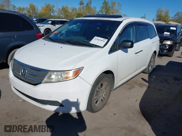 ✅ 2012 Honda Odyssey EX-L • VIN: 5FNRL5H6XCB013011 • Lot: 43469056. Listed on IAAI with 240,505 mi. Free auction sales archive from the USA and detailed vehicle history report at DreamBid. Image 2.