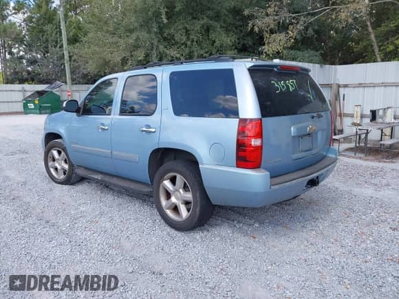 2011 Chevrolet Tahoe LTZ with VIN 1GNSCCE01BR315857, listed as a IAAI auction lot 43455908 with 263,775 mi miles and . Bid and sale history available at DreamBid. Image 3.