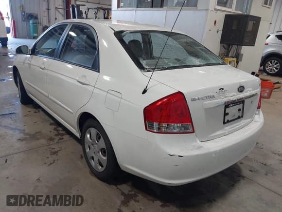 ✅ 2009 Kia Spectra EX • VIN: KNAFE221795662135 • Lot: 43847748. Listed on IAAI with 99,869 mi. Free auction sales archive from the USA and detailed vehicle history report at DreamBid. Image 3.