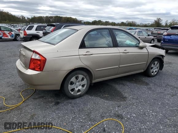 ✅ 2004 Kia Spectra LX • VIN: KNAFE121045058980 • Лот: 86114275. Опубликован ранее на Copart с пробегом 120 608 миль. Бесплатный доступ к архиву аукционных продаж из США и подробный отчёт об истории автомобиля на DreamBid. Изображение 3.