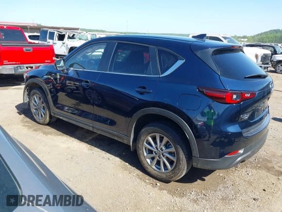 ✅ 2023 Mazda CX-5 S Carbon Edition • VIN: JM3KFBCM2P0250701 • Lot: 42272818. Listed on IAAI with 11,949 mi. Free auction sales archive from the USA and detailed vehicle history report at DreamBid. Image 3.