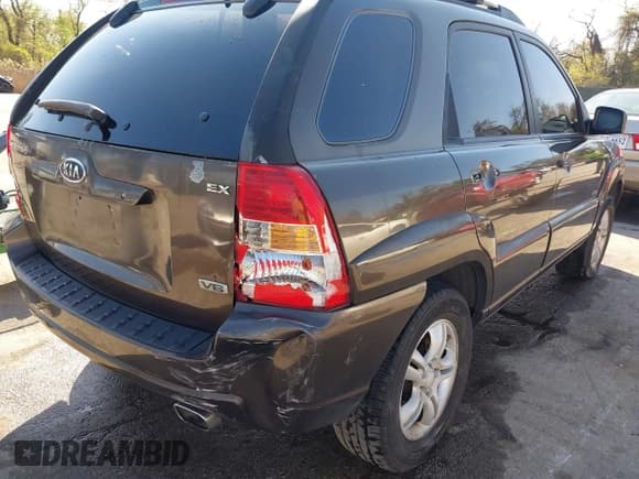 ✅ 2006 Kia Sportage LX • VIN: KNDJE723267219158 • Lot: 42055910. Listed on IAAI with 156,906 mi. Free auction sales archive from the USA and detailed vehicle history report at DreamBid. Image 18.