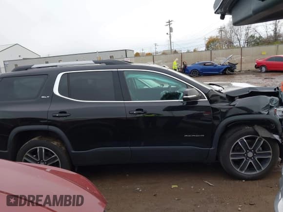 ✅ 2023 GMC Acadia SLT • VIN: 1GKKNMLS1PZ222281 • Lot: 43660865. Listed on IAAI with 46,873 mi. Free auction sales archive from the USA and detailed vehicle history report at DreamBid. Image 13.