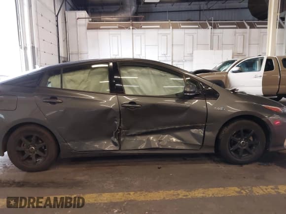 ✅ 2017 Toyota Prius Advanced • VIN: JTDKARFP7H3003423 • Лот: 43589206. Опубликован ранее на IAAI с пробегом 133 729 миль. Бесплатный доступ к архиву аукционных продаж из США и подробный отчёт об истории автомобиля на DreamBid. Изображение 13.