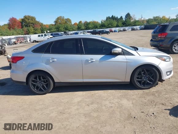 ✅ 2016 Ford Focus SE • VIN: 1FADP3F2XGL243059 • Lot: 43573859. Listed on IAAI with 104,132 mi. Free auction sales archive from the USA and detailed vehicle history report at DreamBid. Image 13.