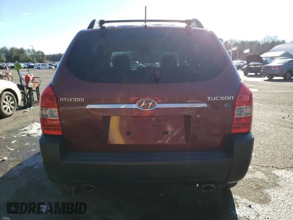 2006 Hyundai Tucson GLS z VIN KM8JN12D66U431452, wystawiony jako Copart lot #83564274 z przebiegiem 229 855 mil mil oraz Szkoda całkowita • Salvage title. Historia ofert i sprzedaży dostępna na DreamBid. Obrazek 6.