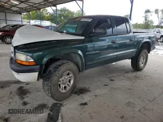✅ 2002 Dodge Dakota SLT • VIN: 1B7HG48Z82S529793 • Lot: 84787935. Wystawiony na Copart z przebiegiem 120 211 mil. Bezpłatny archiwum sprzedaży aukcyjnych z USA i szczegółowy raport historii pojazdu na DreamBid. Zdjęcie 1.