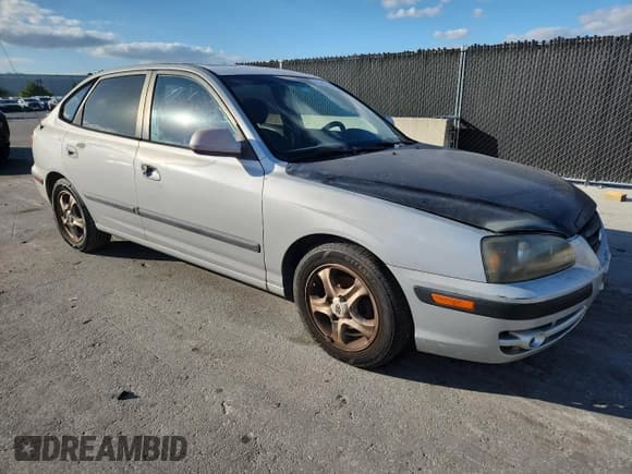 ✅ 2004 Hyundai Elantra GT • VIN: KMHDN56D24U110312 • Lot: 91403945. Listed on Copart with Not provided. Free auction sales archive from the USA and detailed vehicle history report at DreamBid. Image 4.