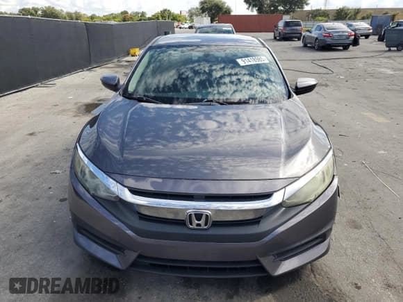 ✅ 2017 Honda Civic LX • VIN: 2HGFC2F59HH569339 • Лот: 91418985. Опубликован ранее на Copart с пробегом 57 108 миль. Бесплатный доступ к архиву аукционных продаж из США и подробный отчёт об истории автомобиля на DreamBid. Изображение 5.