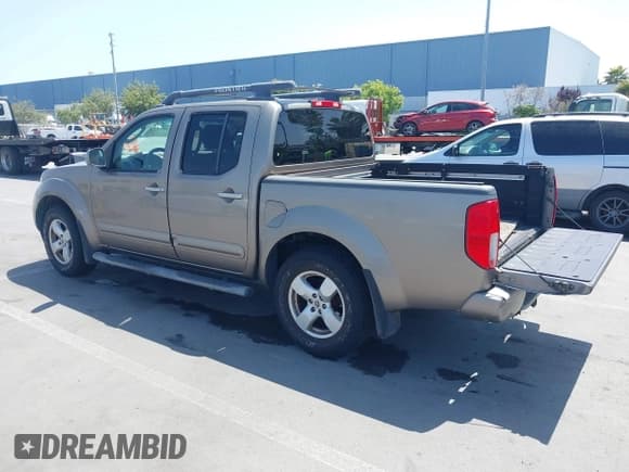 ✅ 2005 Nissan Frontier LE • VIN: 1N6AD07U85C447468 • Lot: 42529960. Listed on IAAI with 182,621 mi. Free auction sales archive from the USA and detailed vehicle history report at DreamBid. Image 3.